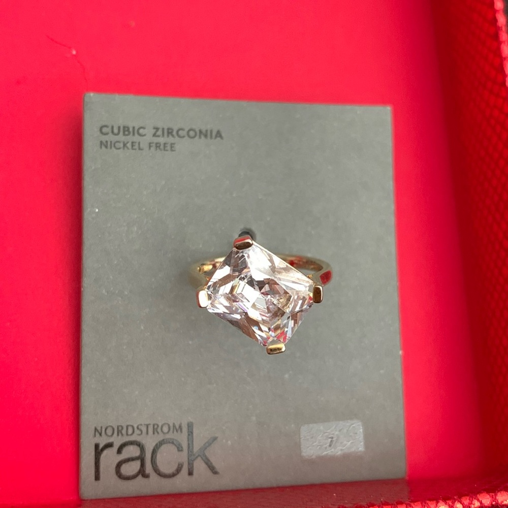 Gorgeous cubic zirconia ring with offset stone. Shines beautifully!